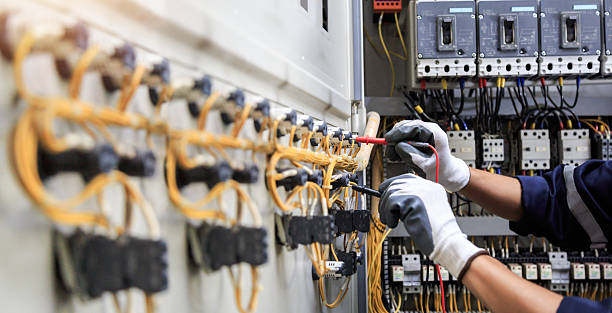 Professional Electrician technician working in Benton County County, MS